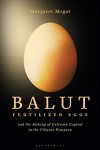 Black book cover with large photo of an egg